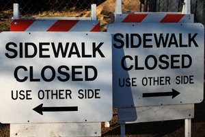 Confusing Sidewalk Signs © https://www.flickr.com/photos/mr_t_in_dc/
