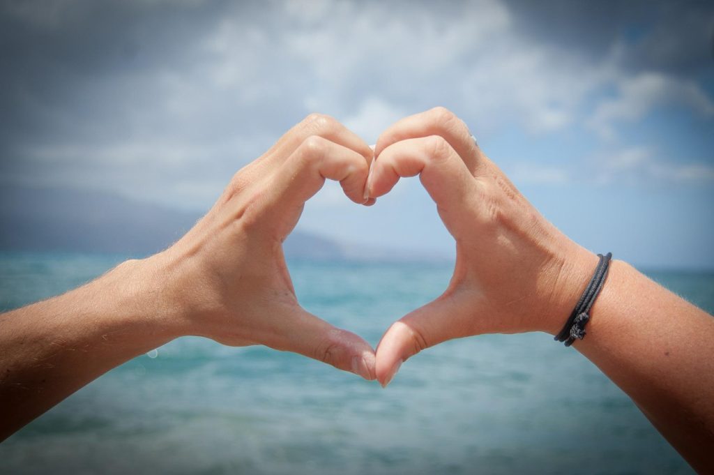 Two hands forming a heart shape